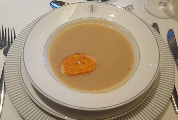 Roasted garlic soup with a cheese crostini